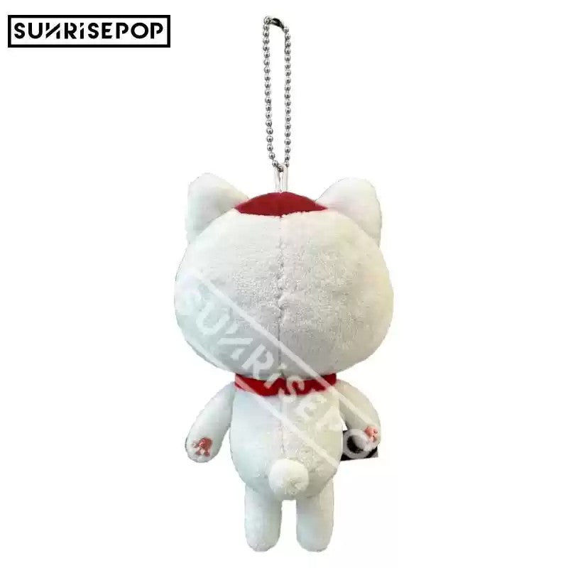 "Anime fan holding Sunrise Pop Dandadan merch"
