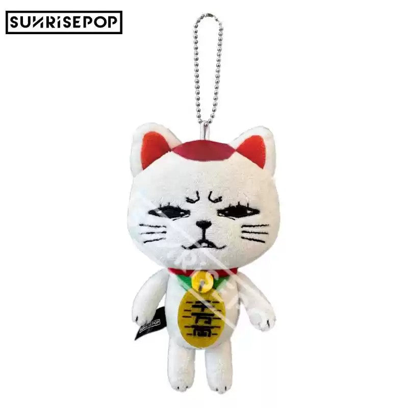 "Anime fan holding Sunrise Pop Dandadan merch"